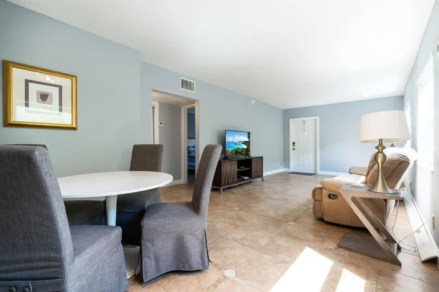 a view of a livingroom with furniture and a couch