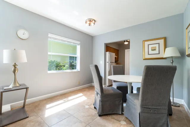 a view of a livingroom with furniture and window