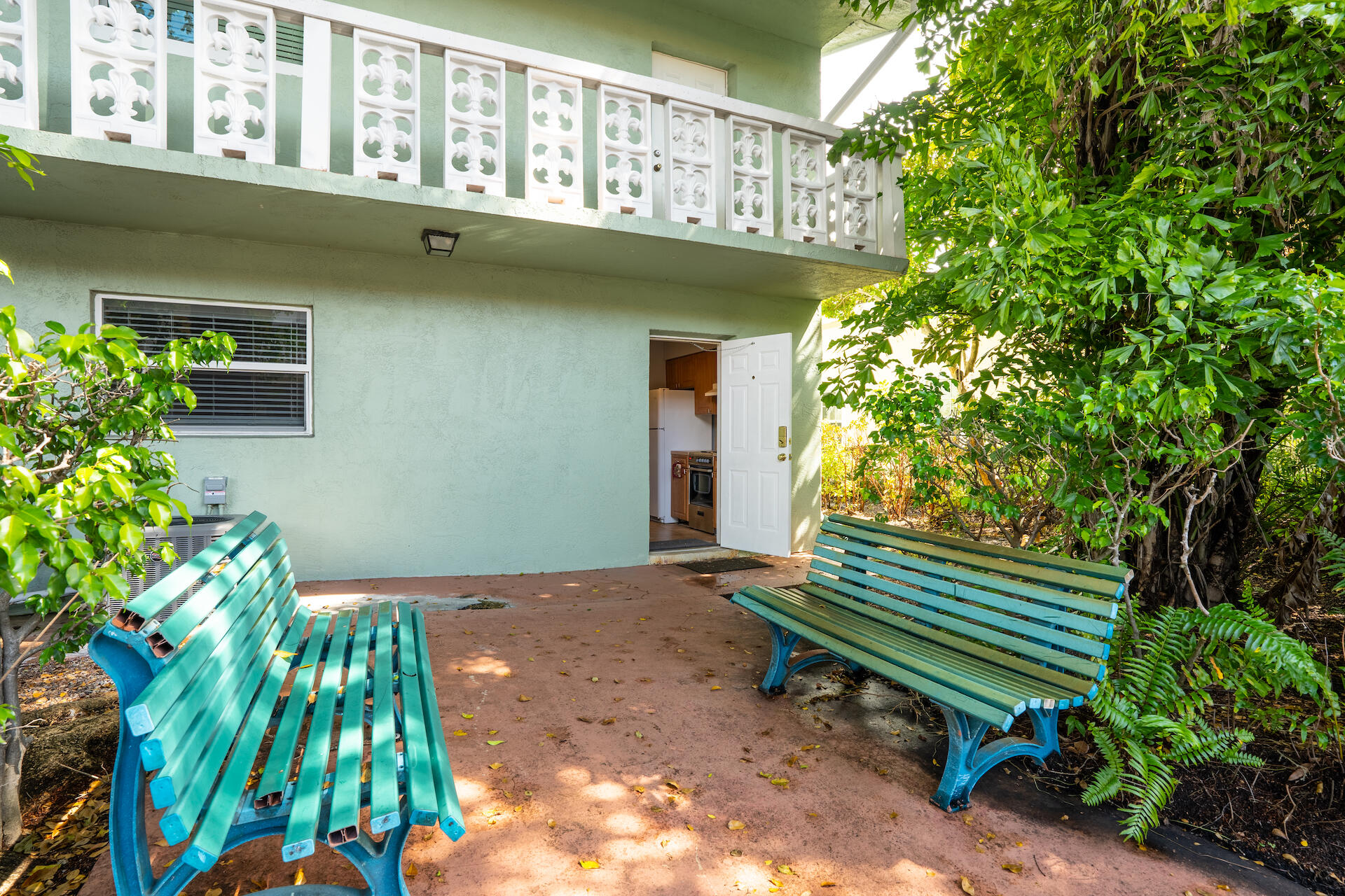 2607 Northeast 8th Avenue, Unit 1 Wilton Manors, FL 33334 - Photo 16 of 22 a house with a flower garden