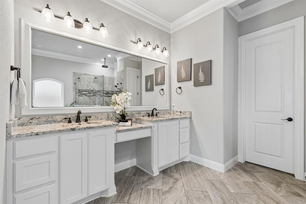 104 Ryder Court Hurst, TX 76053 - Photo 21 of 35 Crown Molding And Designer Lighting Elevate The Primary Bath