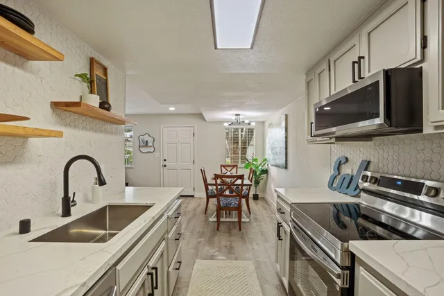 a house view with a backyard space