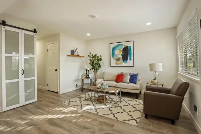 a view of a livingroom with furniture