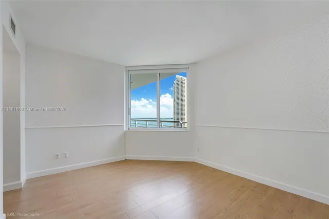 an empty room with a window