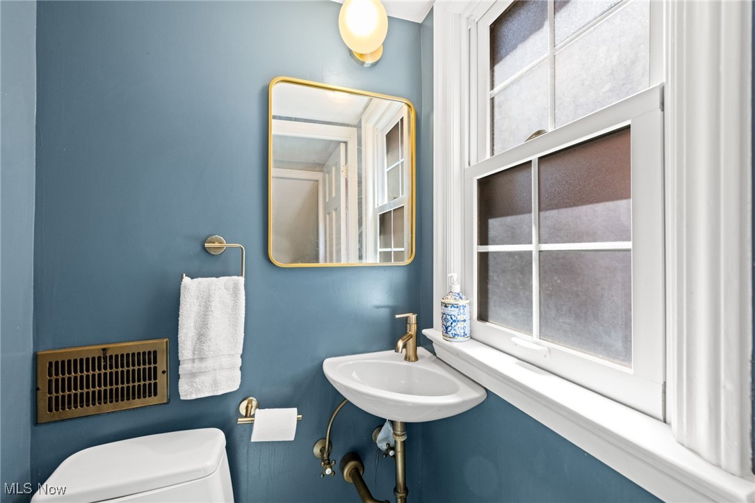 2471 Channing Road Cleveland, OH 44118 - Photo 14 of 33 Half bath with toilet, and a sink