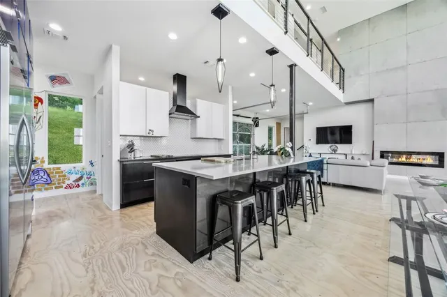 a large kitchen with lots of counter space and appliances