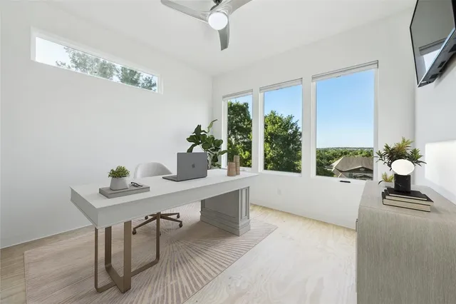 a dining room with furniture and window