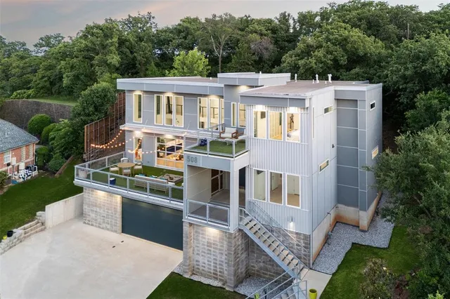 a view of a house with a sink and backyard