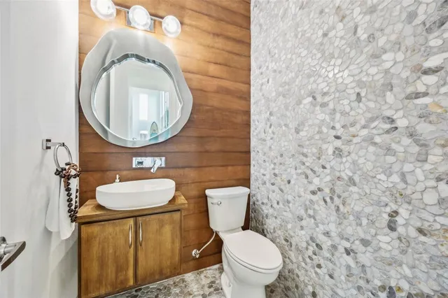a utility room with sink dryer and washer