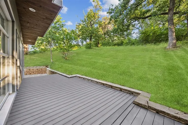 a front view of residential houses with yard