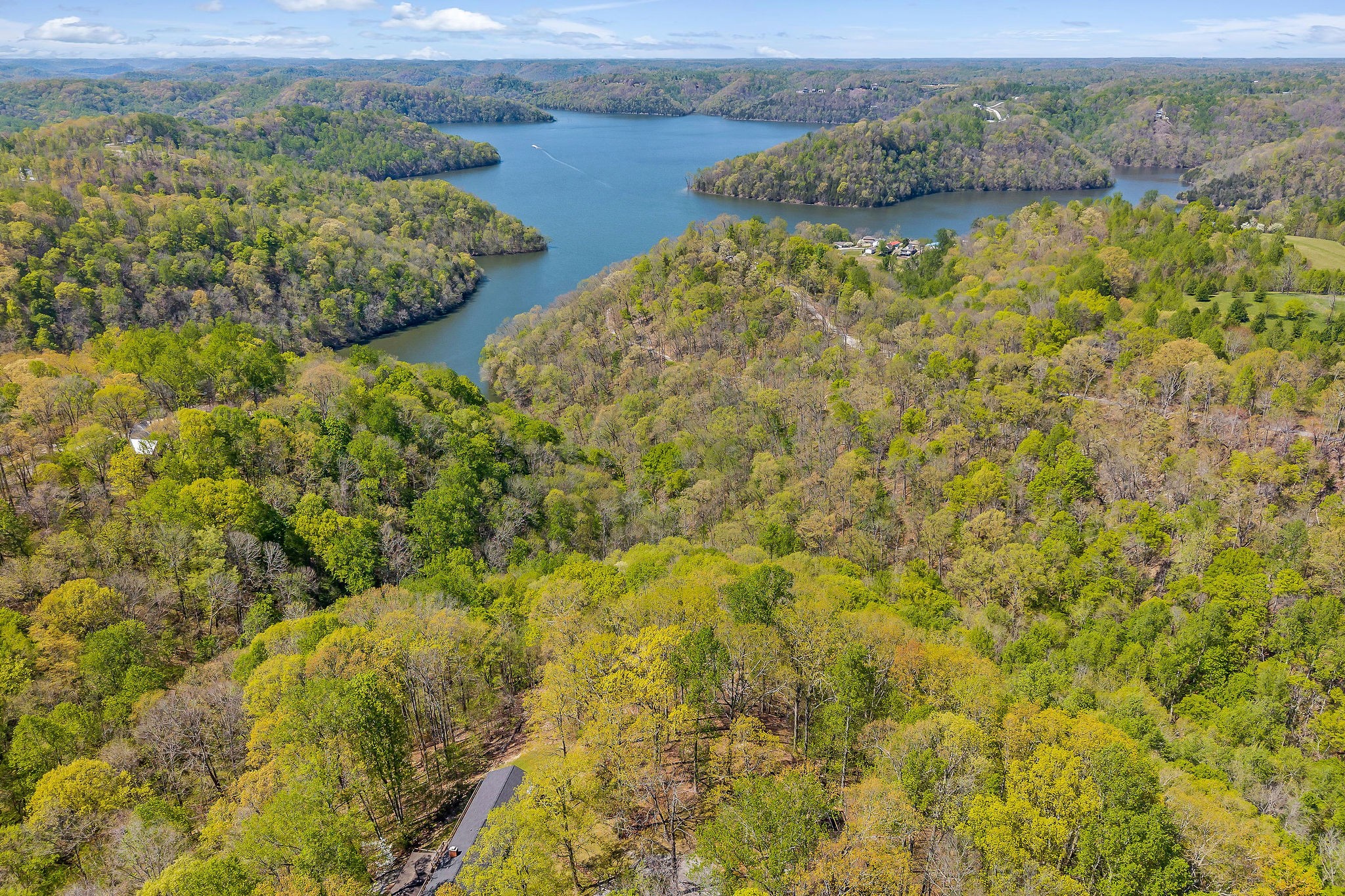 27 Poplar Point Road Sparta, TN 38583 - Photo 4 of 6 a view of a lake from a yard