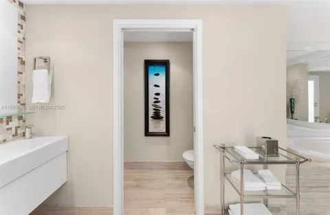 a living room with furniture and white walls