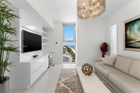 a bathroom with a shower and a sink