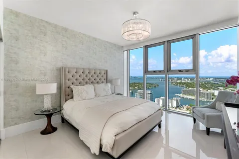 a view of balcony with furniture