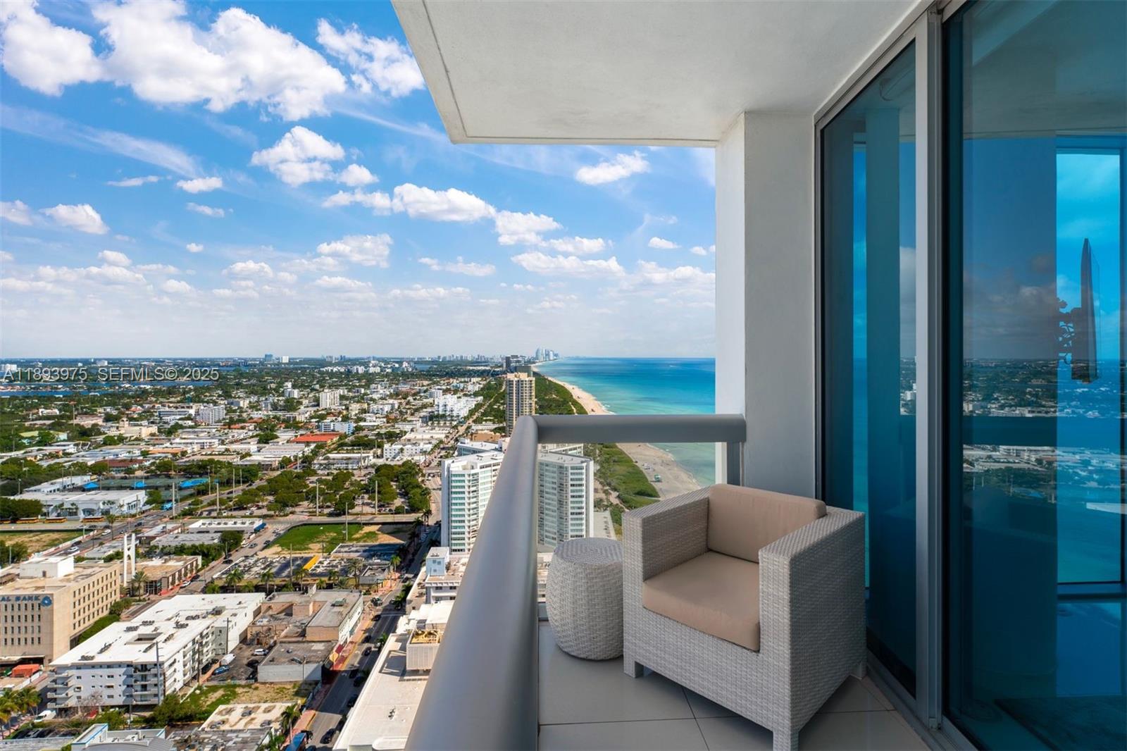 6899 Collins Avenue, Unit LPH04 Miami Beach, FL 33141 - Photo 27 of 29 a view of balcony with furniture