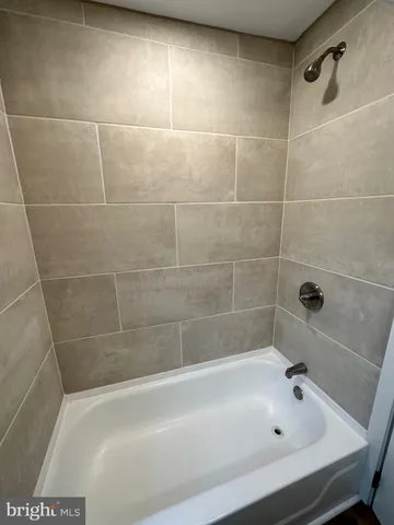 a bathroom with a bathtub