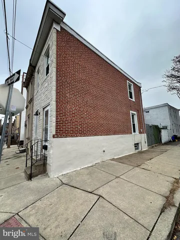 a front view of a house with a garage