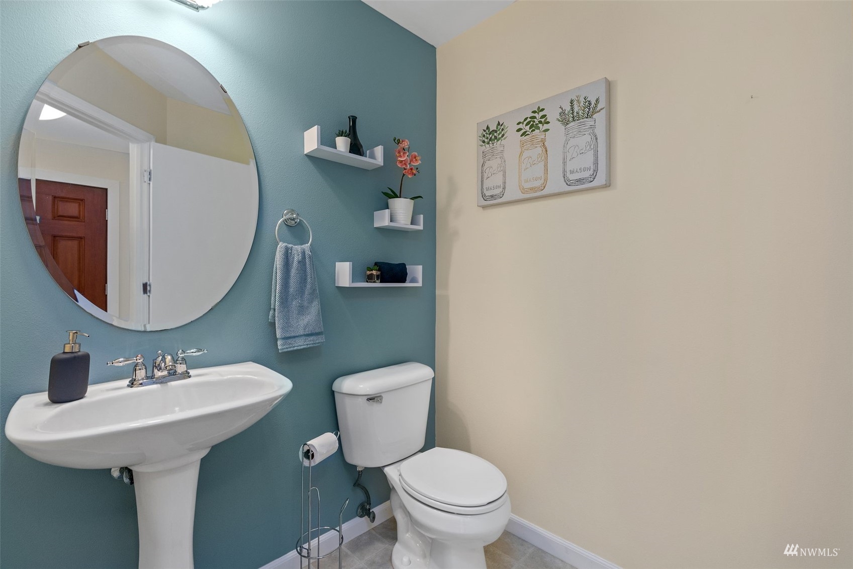 2321 Stafford Way Bothell, WA 98012 - Photo 11 of 38 a bathroom with a toilet sink and mirror