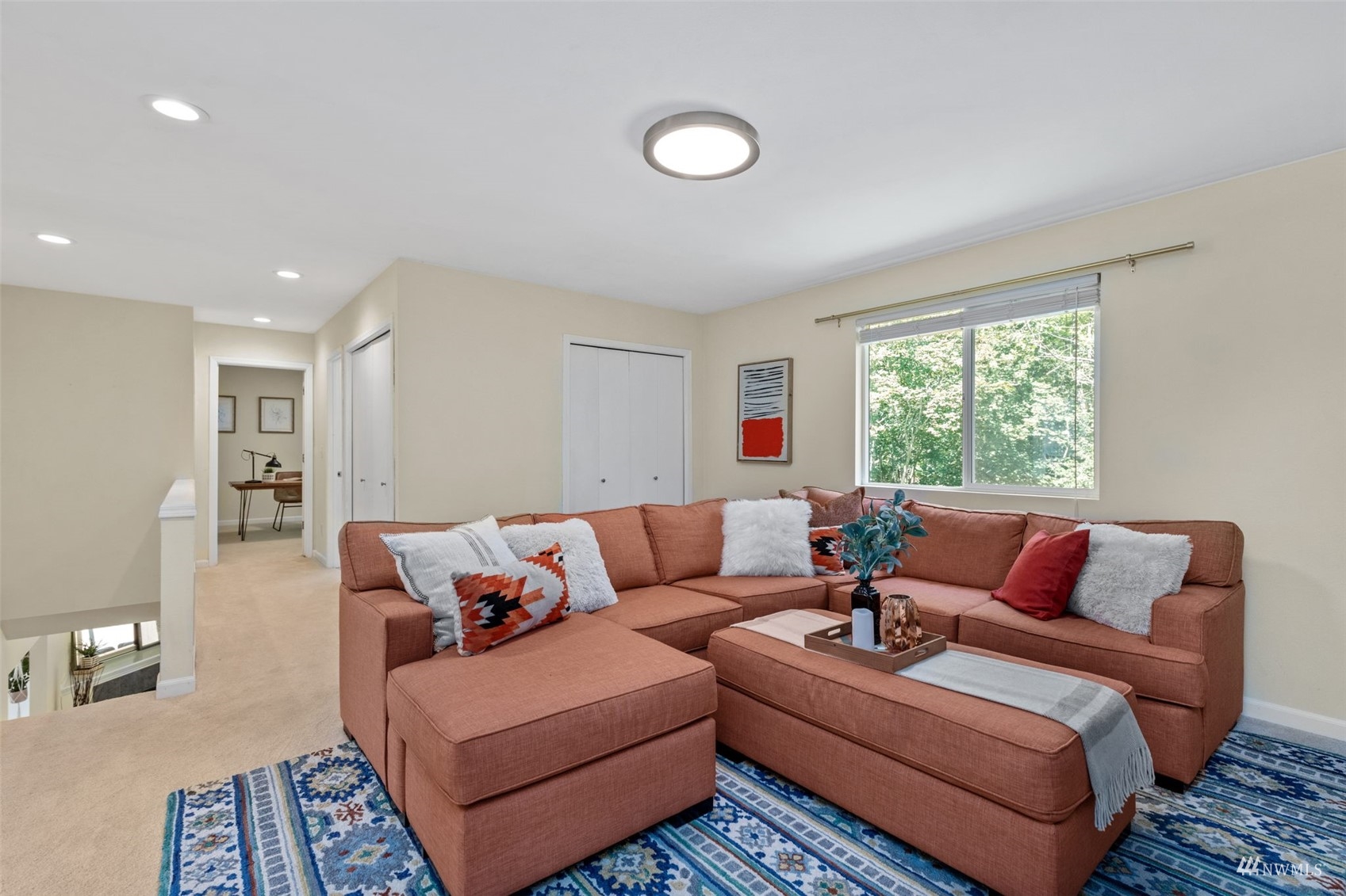 2321 Stafford Way Bothell, WA 98012 - Photo 15 of 38 a living room with furniture and a large window
