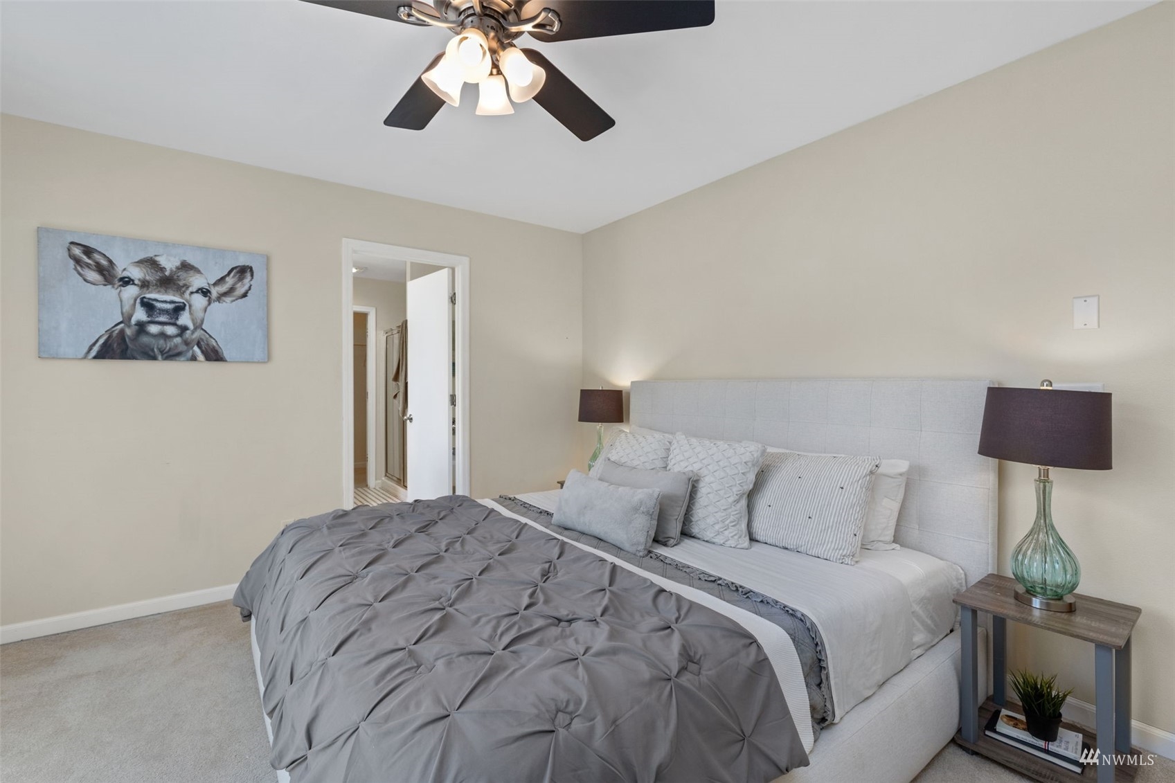 2321 Stafford Way Bothell, WA 98012 - Photo 17 of 38 a bedroom with a bed and a lamp