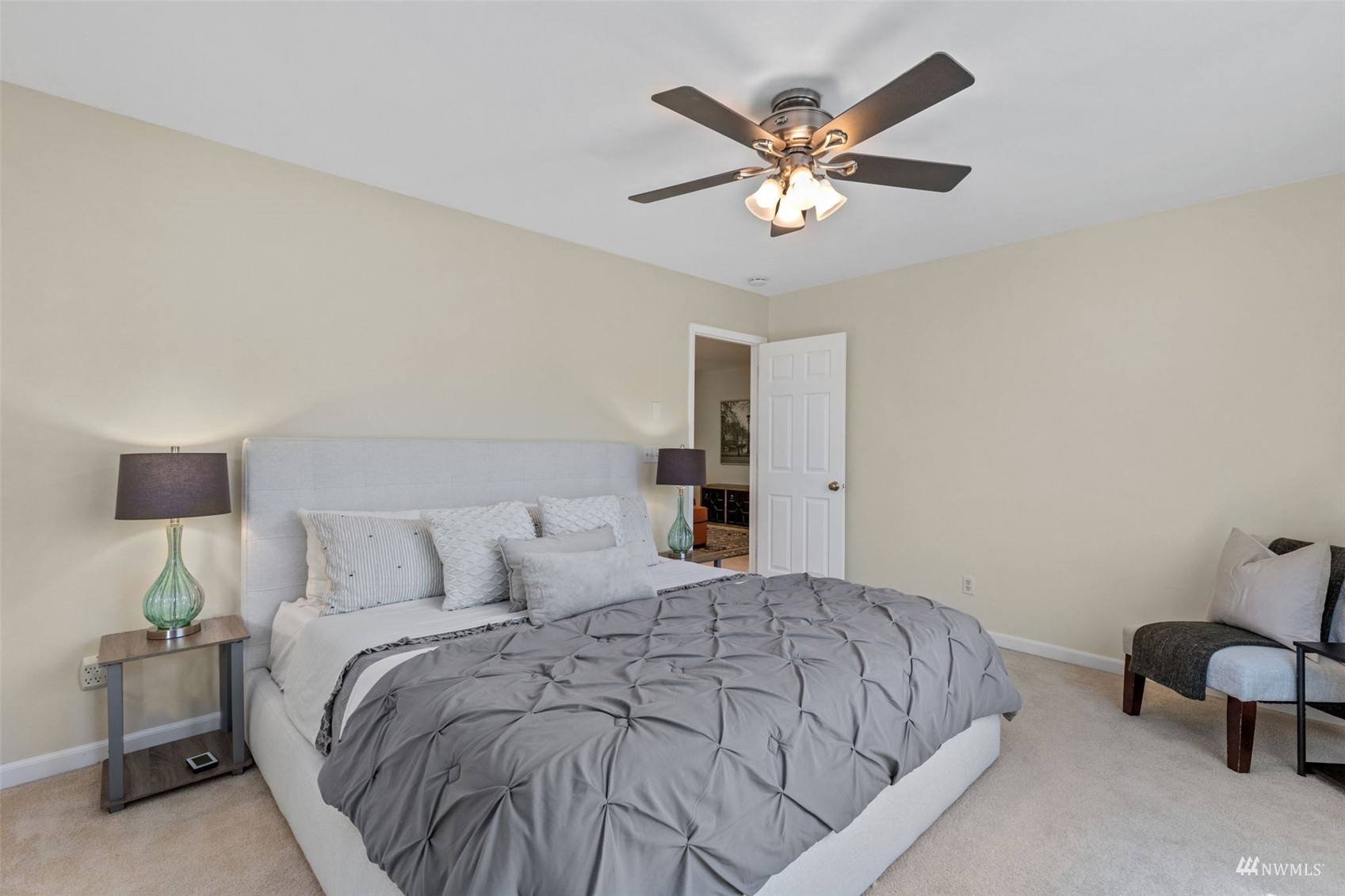2321 Stafford Way Bothell, WA 98012 - Photo 18 of 38 a bedroom with a bed and a lamp on dresser