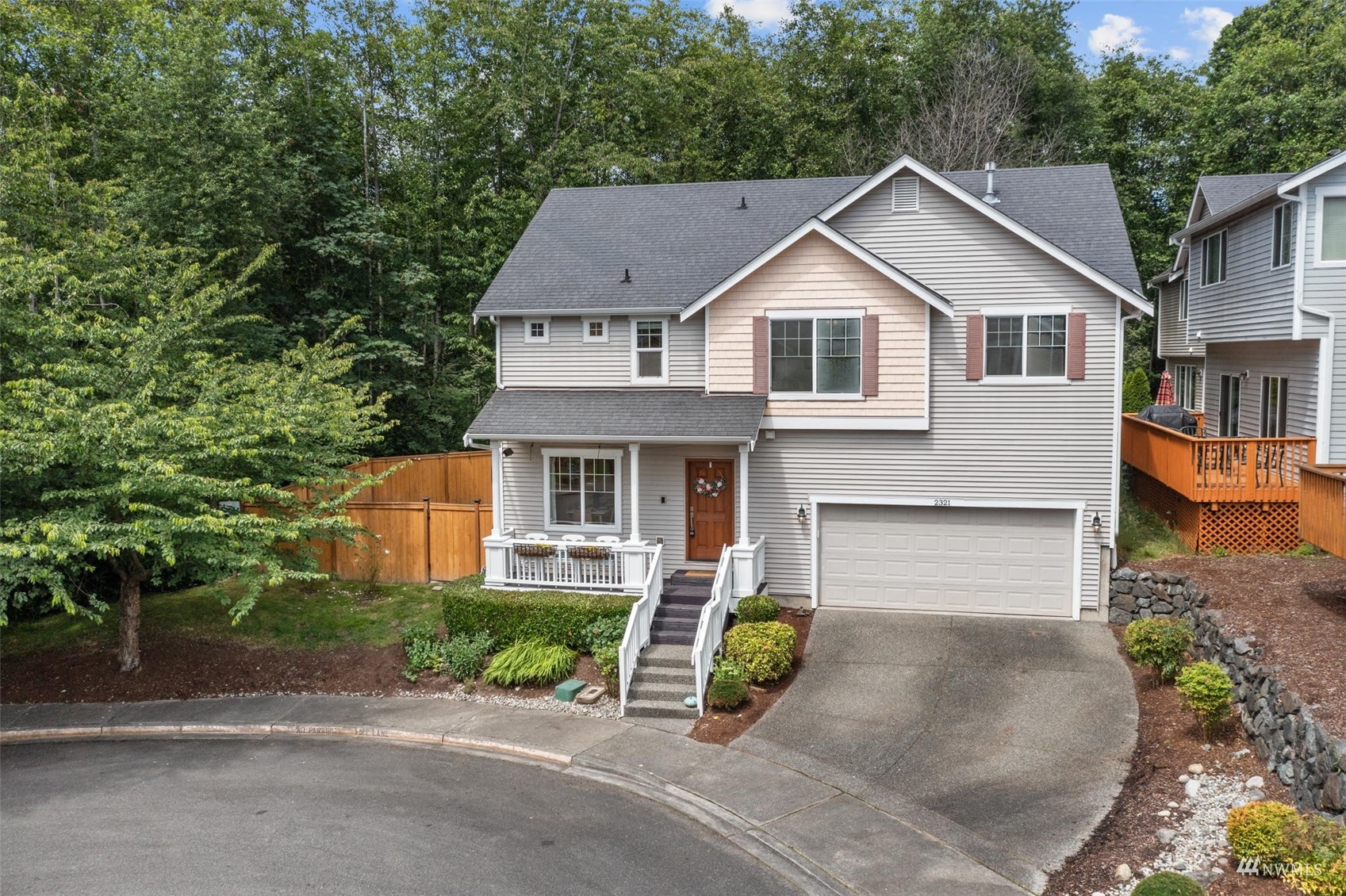 2321 Stafford Way Bothell, WA 98012 - Photo 37 of 38 a front view of a house with a yard and garage