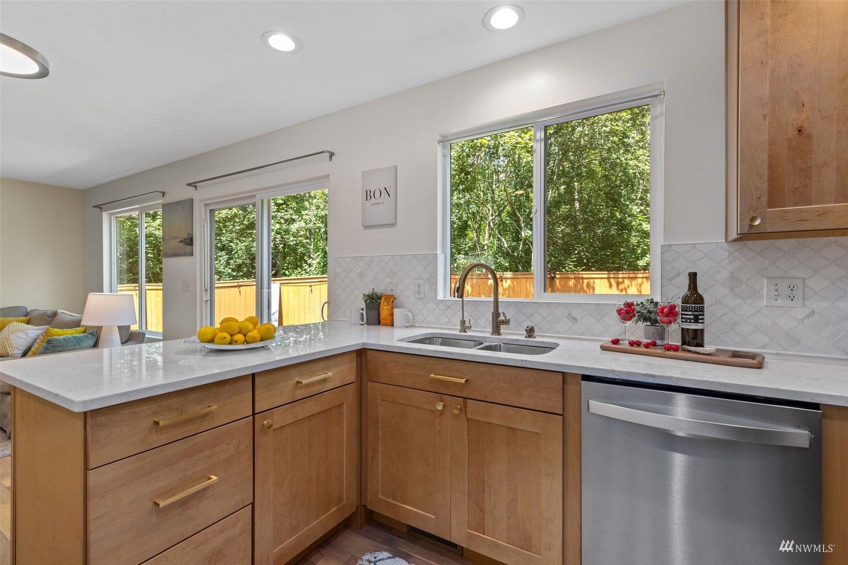 2321 Stafford Way Bothell, WA 98012 - Photo 10 of 38 a kitchen with a sink a window and cabinets