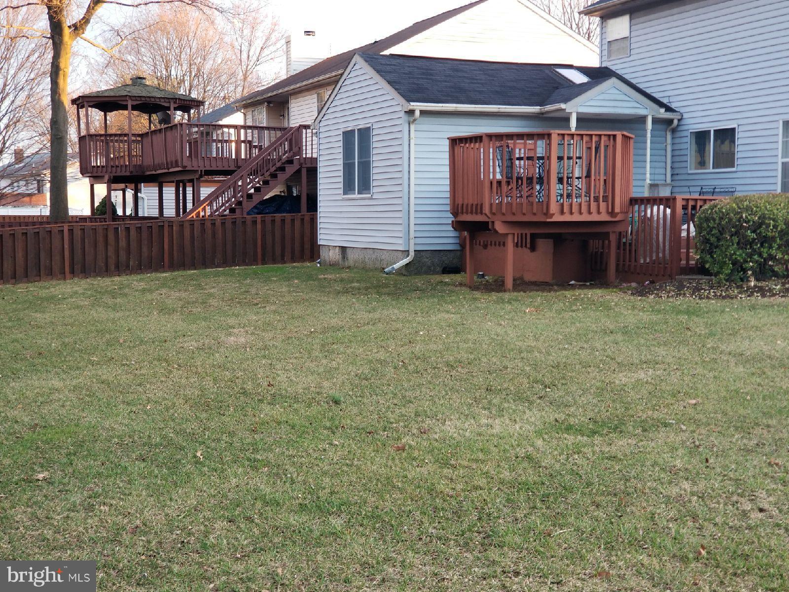 1101 Marksworth Road Baltimore, MD 21207 - Photo 5 of 29 a view of house with backyard and deck