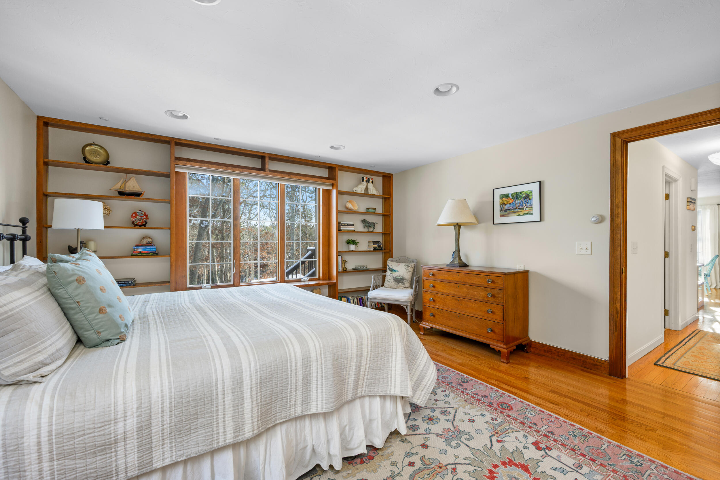 36 Island Street East Dennis, MA 02660 - Photo 12 of 41 a bedroom with a large bed and a large window