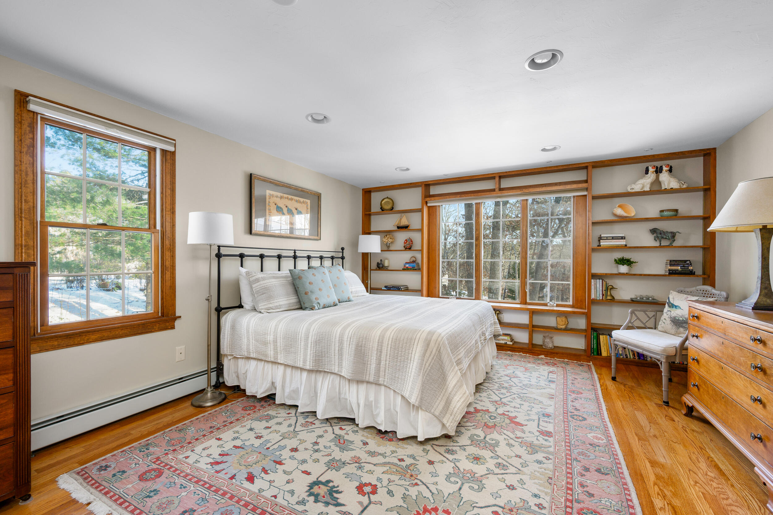 36 Island Street East Dennis, MA 02660 - Photo 13 of 41 a bedroom with a large bed and a large window
