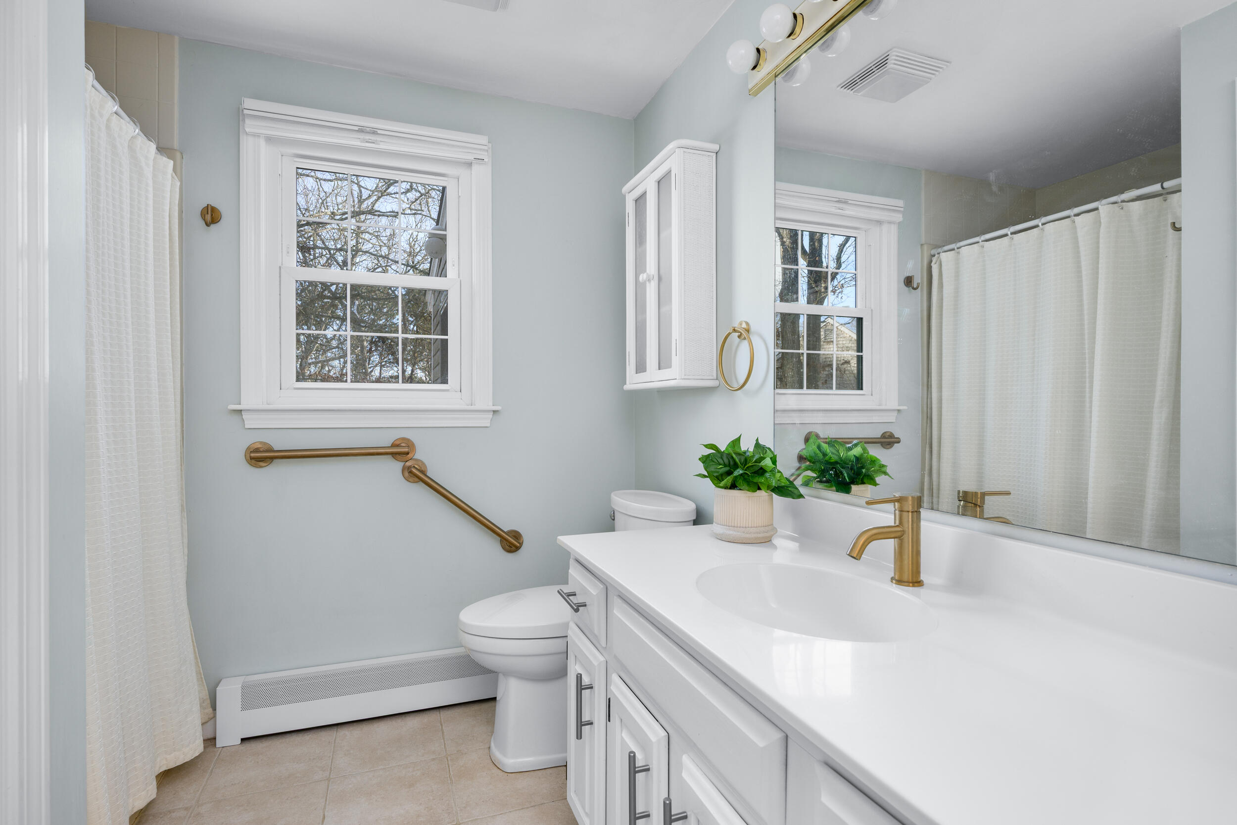 36 Island Street East Dennis, MA 02660 - Photo 15 of 41 a bathroom with a sink toilet and shower