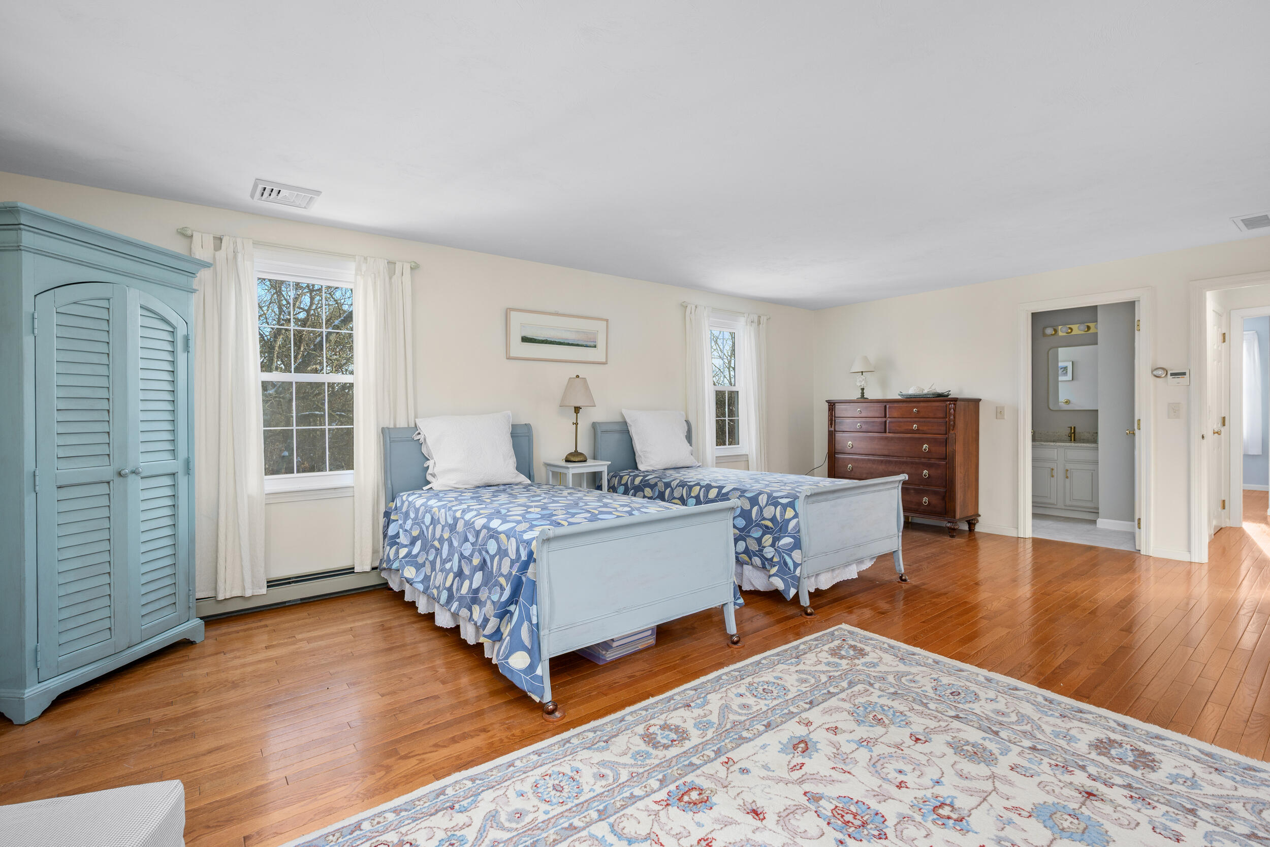 36 Island Street East Dennis, MA 02660 - Photo 19 of 41 a living room with furniture and a wooden floor