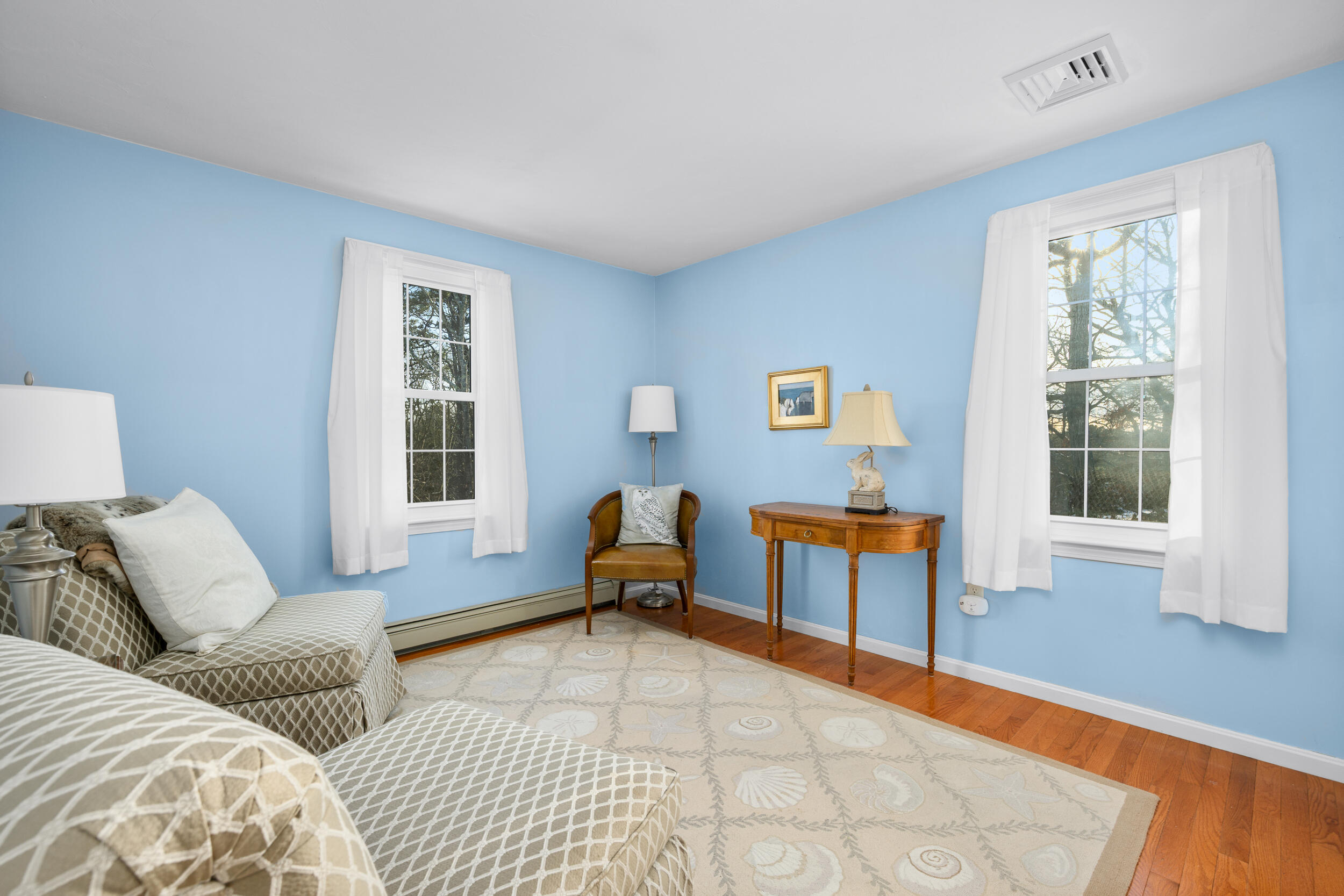 36 Island Street East Dennis, MA 02660 - Photo 21 of 41 a bedroom with furniture and a window
