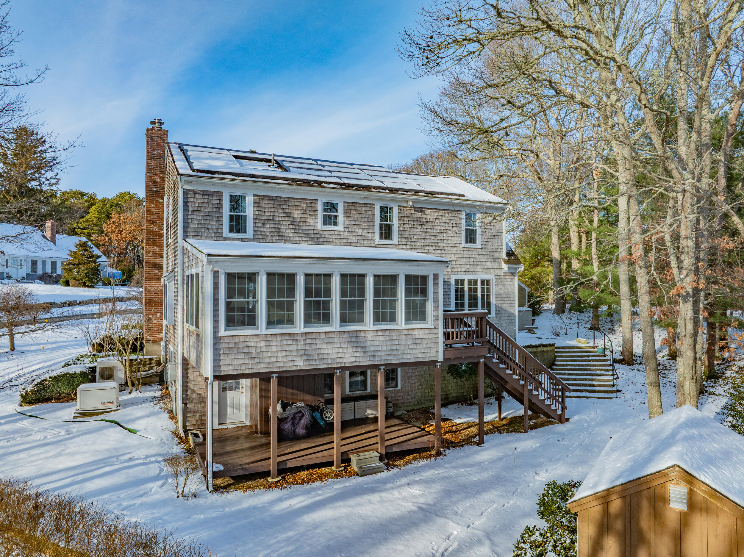36 Island Street East Dennis, MA 02660 - Photo 32 of 41 a view of a house with a balcony