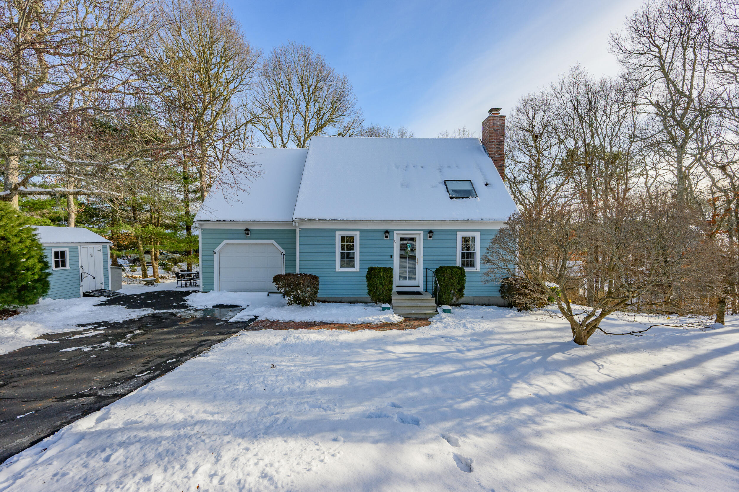 36 Island Street East Dennis, MA 02660 - Photo 37 of 41 a front view of a house with a patio