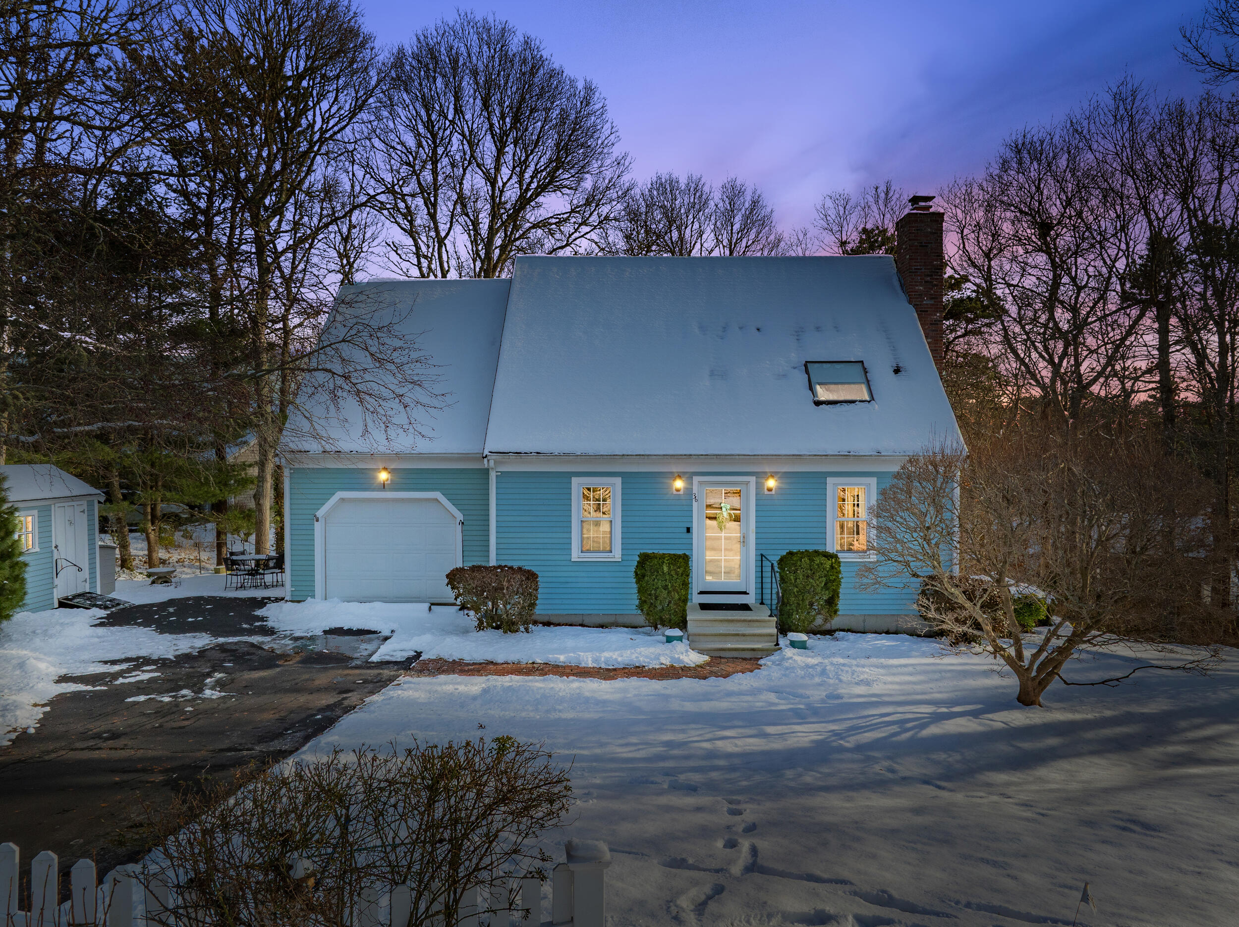 36 Island Street East Dennis, MA 02660 - Photo 40 of 41 a front view of a house with garden