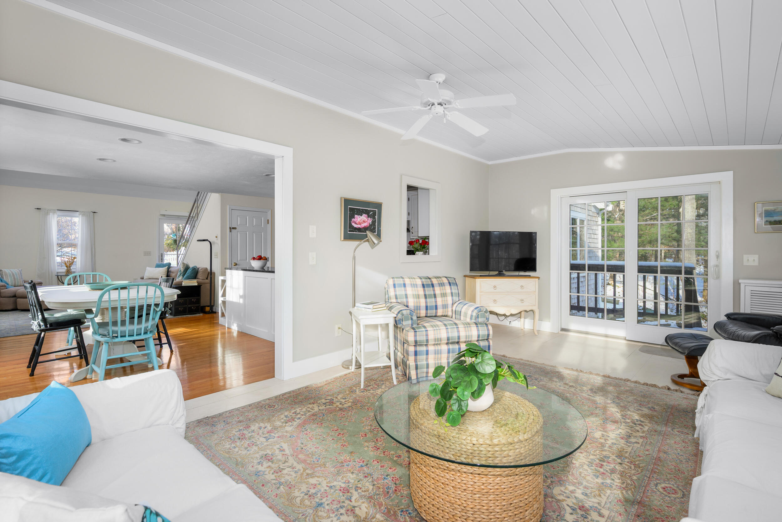 36 Island Street East Dennis, MA 02660 - Photo 5 of 41 a living room with furniture a flat screen tv and a large window