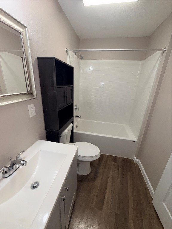 13217 Player Street, Unit B Houston, TX 77045 - Photo 13 of 22 a bathroom with a sink a toilet and shower