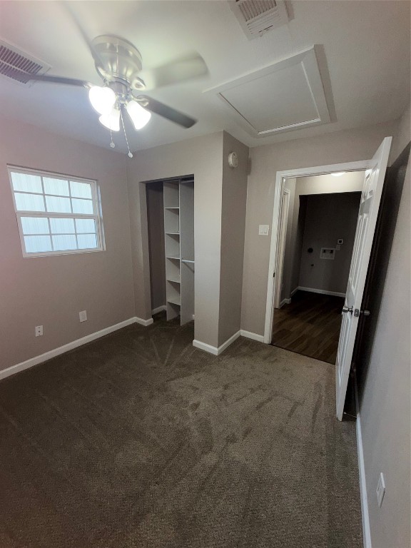 13217 Player Street, Unit B Houston, TX 77045 - Photo 14 of 22 en empty room with windows and entrance
