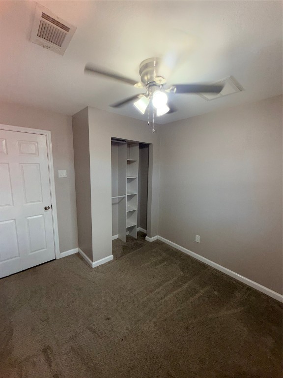 13217 Player Street, Unit B Houston, TX 77045 - Photo 16 of 22 an empty room with closet and a ceiling fan