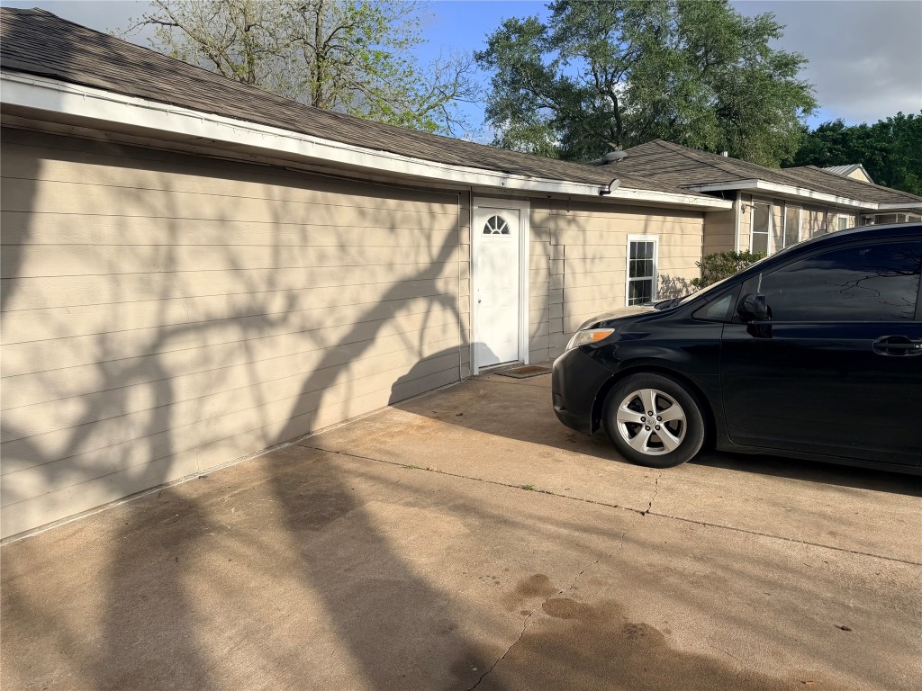 13217 Player Street, Unit B Houston, TX 77045 - Photo 2 of 22 a car parked in front of a house