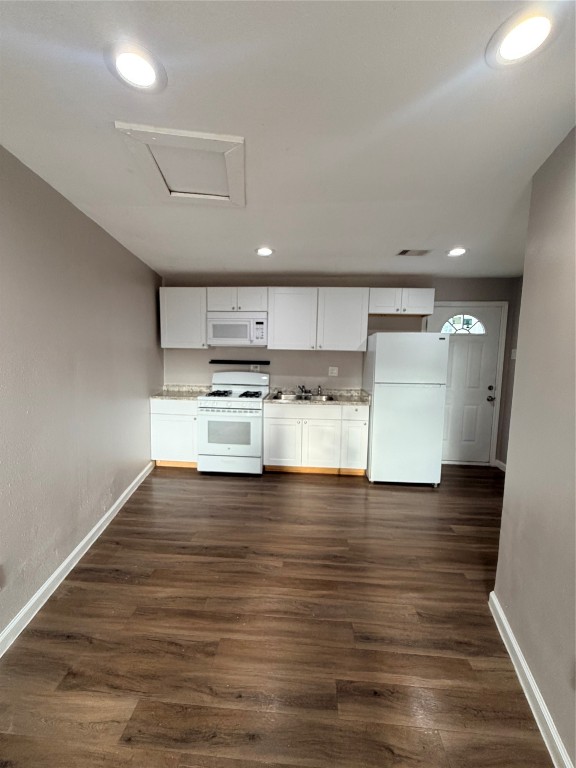 13217 Player Street, Unit B Houston, TX 77045 - Photo 3 of 22 a view of kitchen with wooden floor