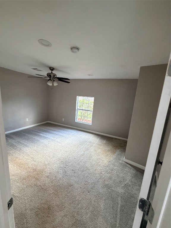 13217 Player Street, Unit B Houston, TX 77045 - Photo 4 of 22 an empty room with windows