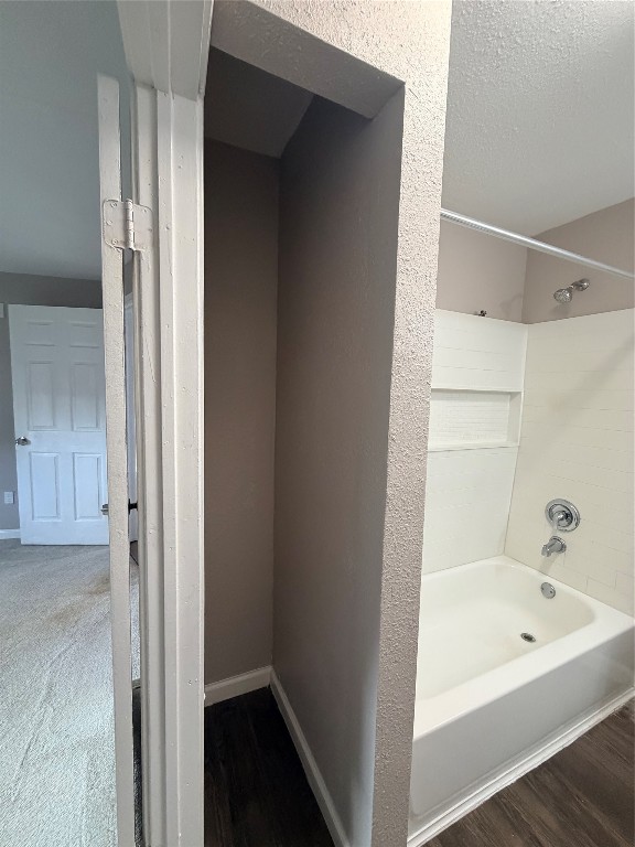 13217 Player Street, Unit B Houston, TX 77045 - Photo 6 of 22 a bathroom with a bathtub