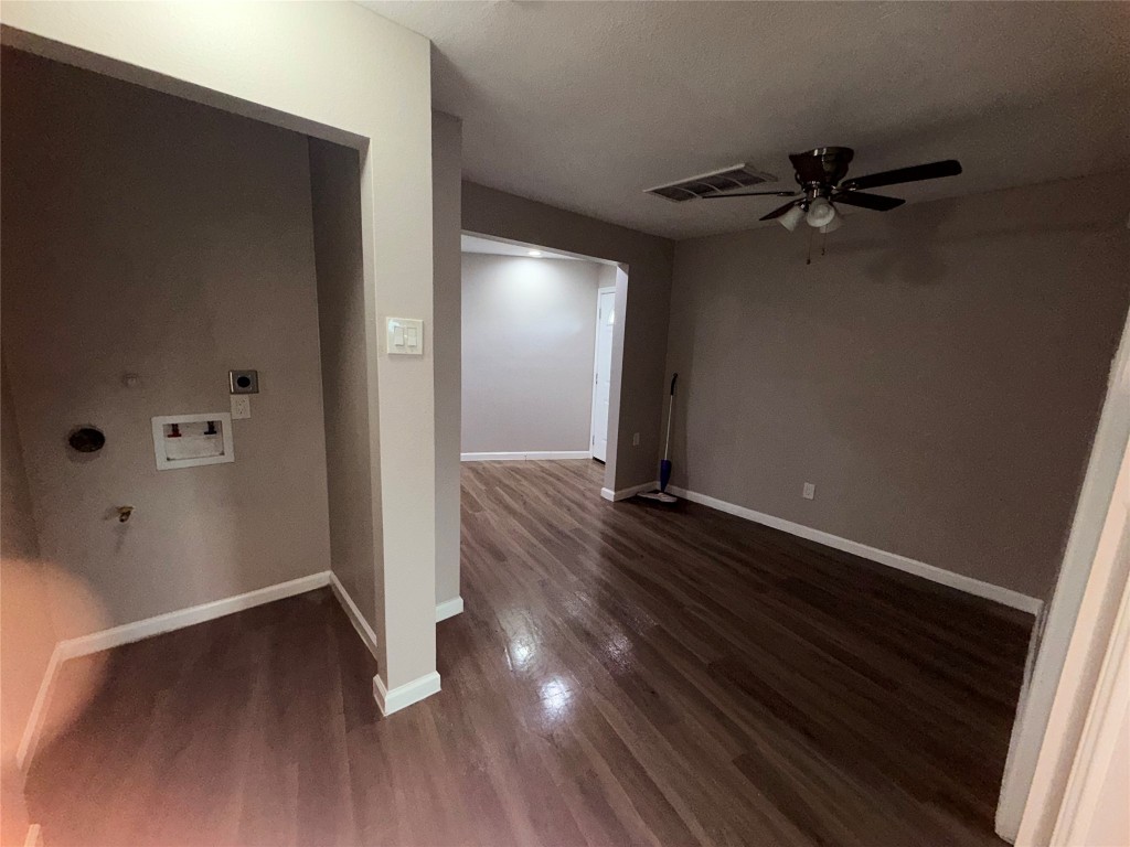 13217 Player Street, Unit B Houston, TX 77045 - Photo 10 of 22 wooden floor in an empty room