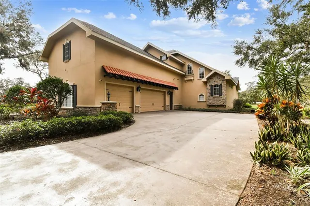 $1,395,000 | 12709 Mannhurst Oak Lane, Lithia, FL 33547