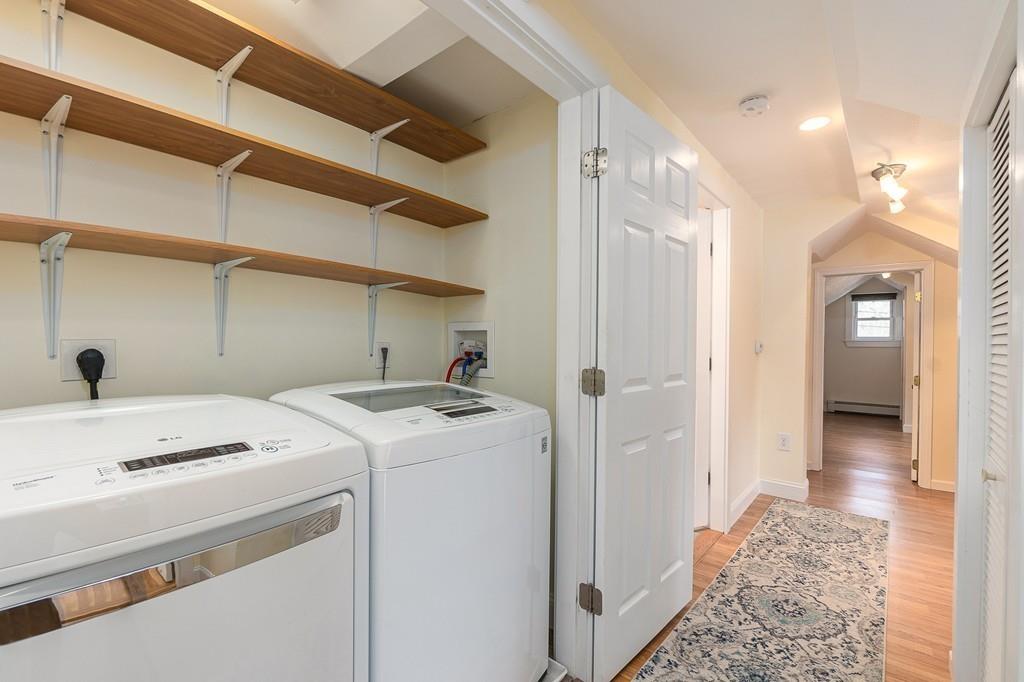 24 Wheeler Road Bolton, MA 01740 - Photo 14 of 28 a view of utility room with washer and dryer