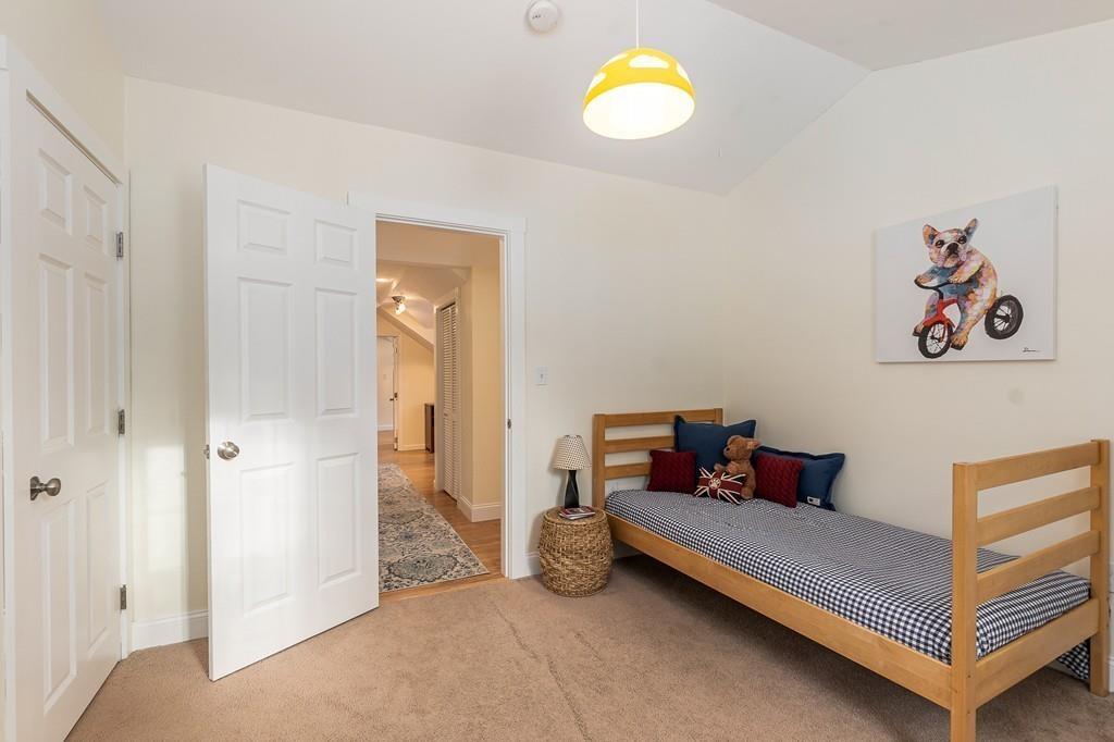 24 Wheeler Road Bolton, MA 01740 - Photo 17 of 28 a bedroom with furniture and a window