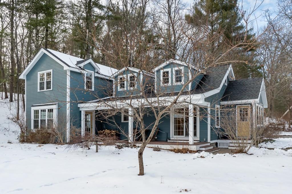 24 Wheeler Road Bolton, MA 01740 - Photo 22 of 28 a front view of a house with yard