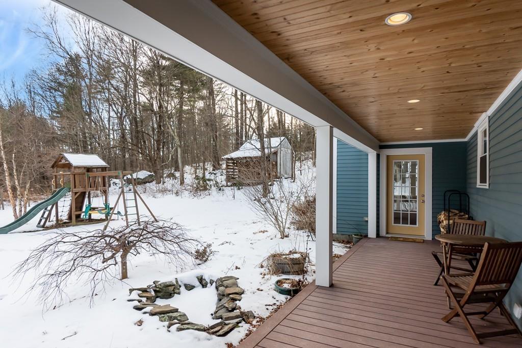 24 Wheeler Road Bolton, MA 01740 - Photo 24 of 28 a outdoor space with lots of chairs and chandelier