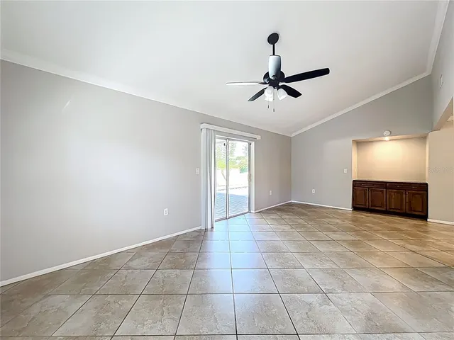 a view of a kitchen with a sink and a window